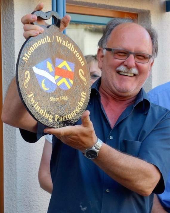 Waldbronn Club Chairman, Manfred Czychi with a present from Monmouth
