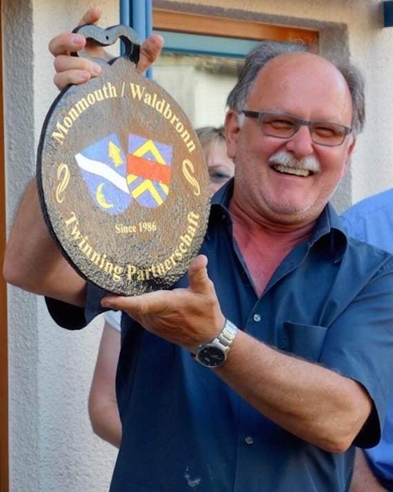 Waldbronn Club Chairman, Manfred Czychi with a present from Monmouth