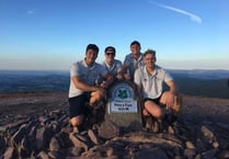 Rugby club members tackle the country’s highest peaks