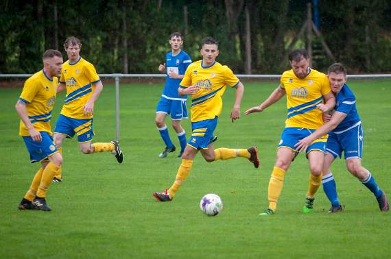 Monmouth striker Leo Ross scored his side’s second after being brought down in the box