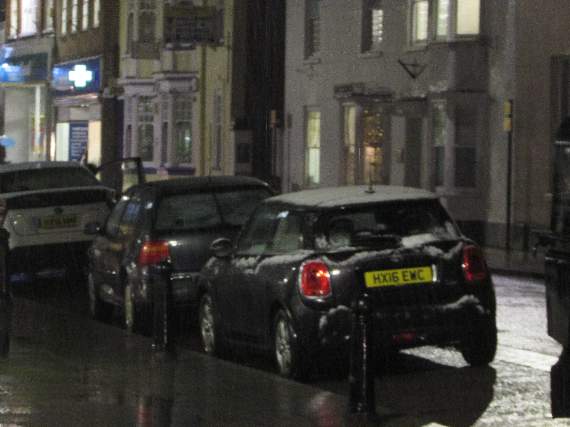 Snow starting to settle on cars in Petersfield town centre