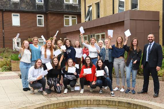 The Monmouth girls with their glowing results.