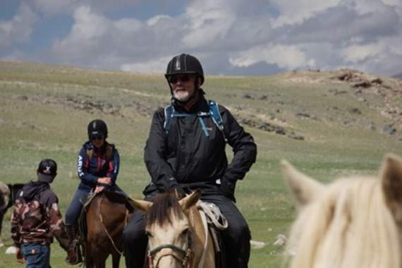 Stewart on horseback