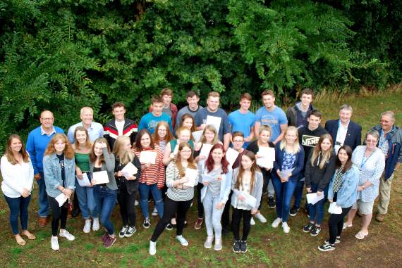 Students, staff and trustees celebrate outstanding results.