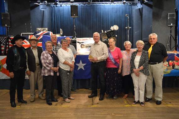 Pictured with Anne Gray and Mike Keel are some of the volunteers who helped at the Country Music Festival.