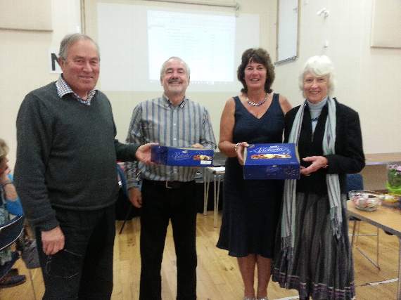 Caroline Hallett and Steve Dooley presenting the prize for top EW to Phil and Mary Palmer.