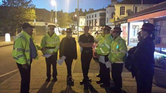 Police cadets on the streets of Kingsbridge raising awareness of flooding
