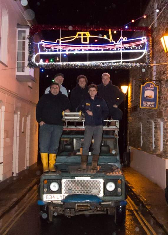 The new lifeboat feature above Union Street, with the Salcombe Lifeboat crew and lighting committee. Back row, left to right - Mike Wrigley, Sam Viles and Rob Park. Front row, Cameron Sims-Stirling and Rich Park
