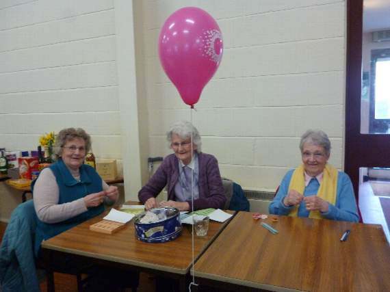 Left to right, Ann’s mother Sheila Harvey, Jean Tarr and Mary Petit doing the raffle