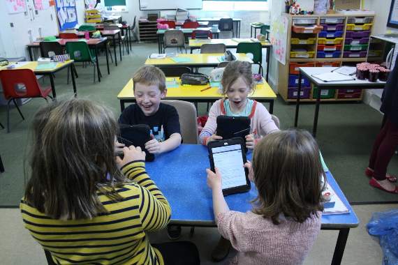 Modern day learning – pupils are equipped in the classroom with computer tablets