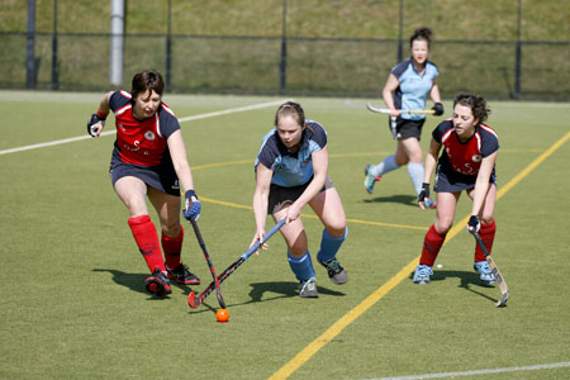 The Cougars' Lulu Read and Helen Symons keep their eyes on the ball