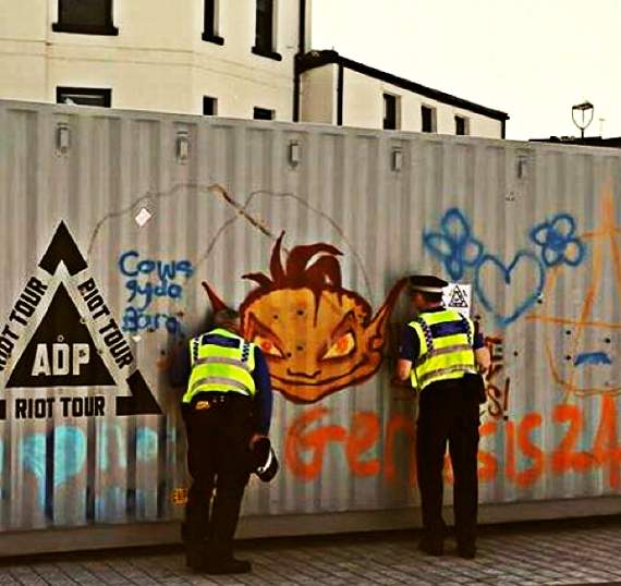 What's going on here then? Police officers take a look