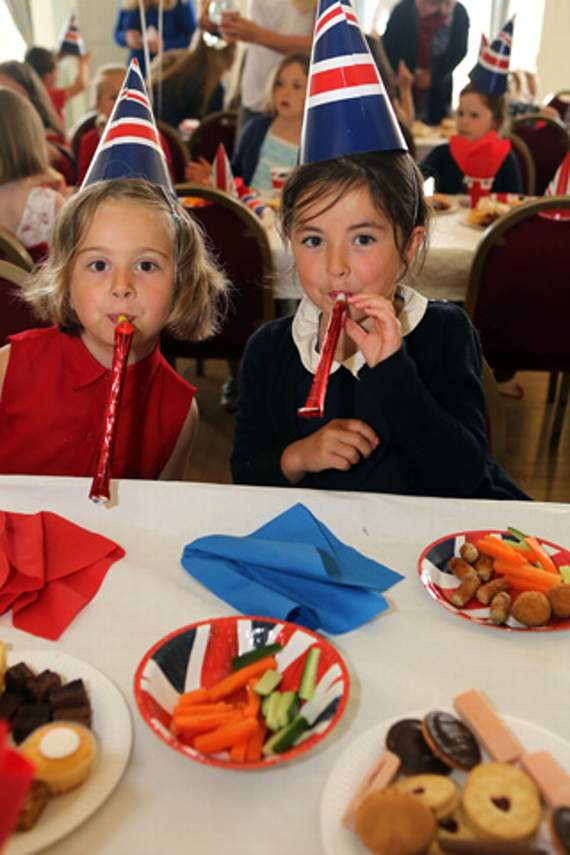 Ayla and Jasmine having fun at the tea part for the Queen's 90th birthday