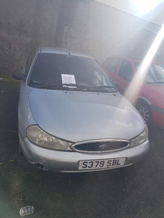 The car in the Kings Arms car park, with blacked out windows from the fire (Sam Acourt)