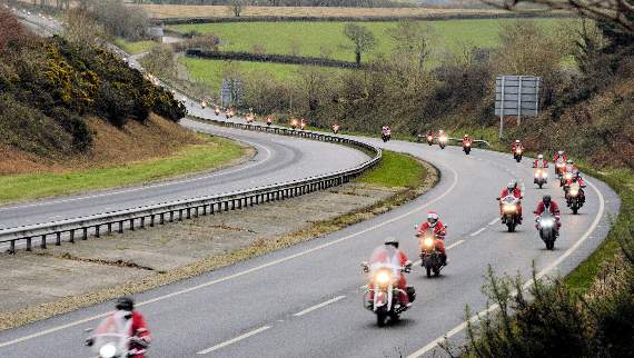 A confusing sight for any young enough to believe in just the one Father Christmas