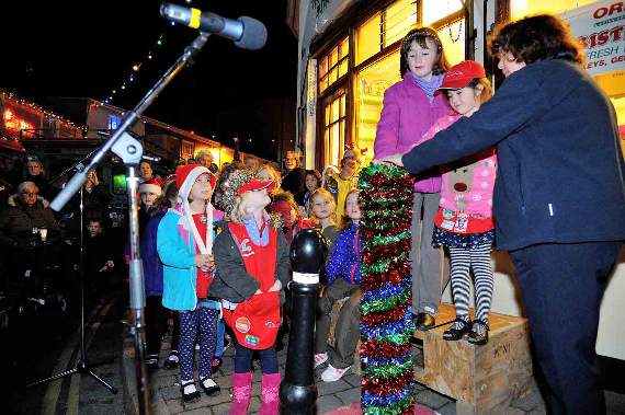The lights were switched-on by Bronte Harrod and Ayla Arteaga, members of Salcombe Rainbows and Brownies