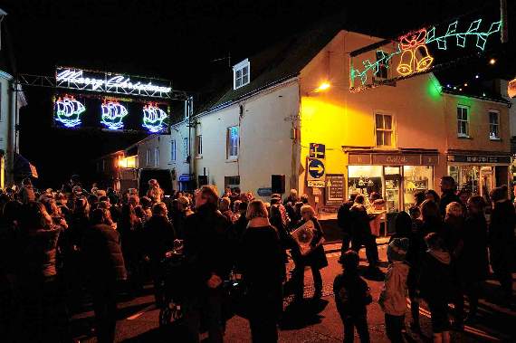Families and friends gather to enjoy the traditional switching on of Salcombe's Christmas lights