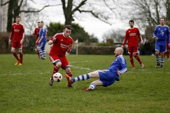 Jake Blamey keeps possession under pressure