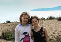 Carys and Matilda raise money for charity with walk from Start Point to Strete Gate