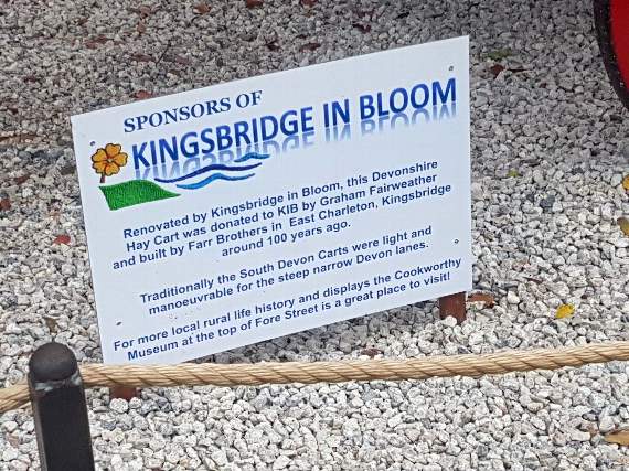 The sign explaining the history of the cart