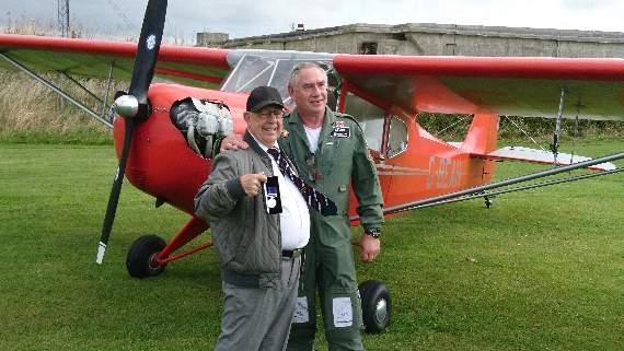Mike Evans, proudly displaying his General Service Medal with his son, Mike Swann at Bolt Head airfield (Debby Sanders)