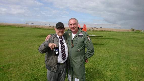 Mike Evans, proudly displaying his General Service Medal with his son, Mike Swann at Bolt Head airfield (Debby Sanders)