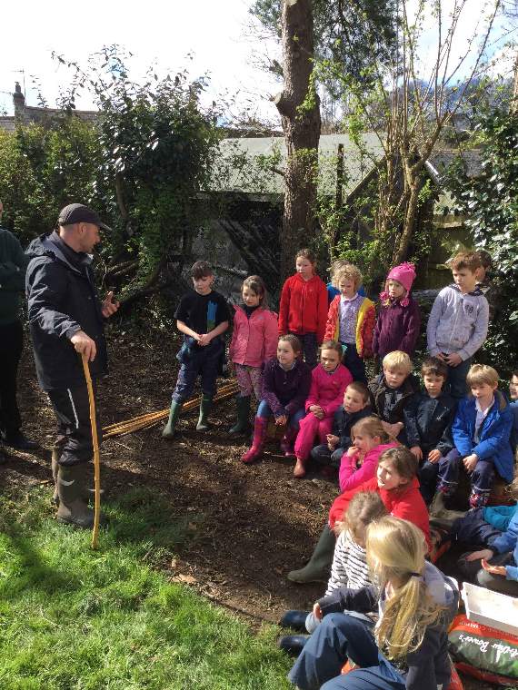 Pupils building an African keyhole garden at Aveton Gifford Primary School
