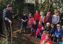 Aveton Gifford children build an African keyhole garden