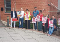 VIDEO: Dr Sarah Wollaston faced protests as she arrived at a public meeting last night