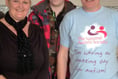 Scott sports pink mohican for Autism Awareness Month