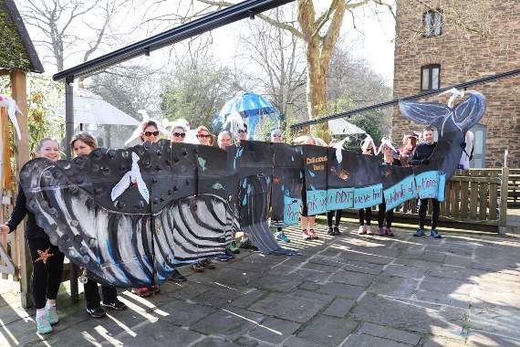 South Devon TV: Winners of the fancy dress prize the Stokenham Spamers as Doris the Start Bay humpback whale