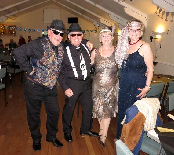 Members enjoying themselves at the 1920s themed Gin and Jazz Night