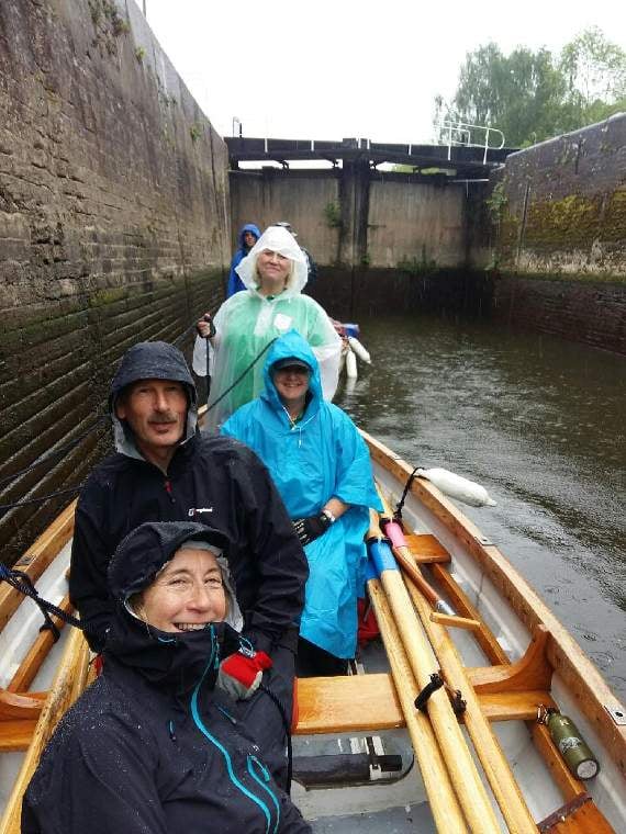 Members of Kingswear Rowing Club in lock