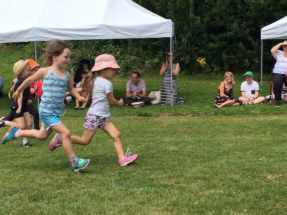 Children race at Merry Go Round Preschool sports day