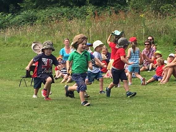 Children race at Merry Go Round Preschool sports day