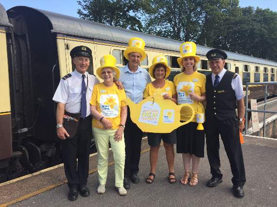 Volunteers on the Marie Curie Tea Party Train with Dartmouth Steam Train Company Staff