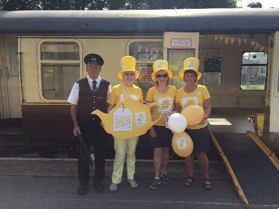 Volunteers on the Marie Curie Tea Party Train with Dartmouth Steam Train Company Staff