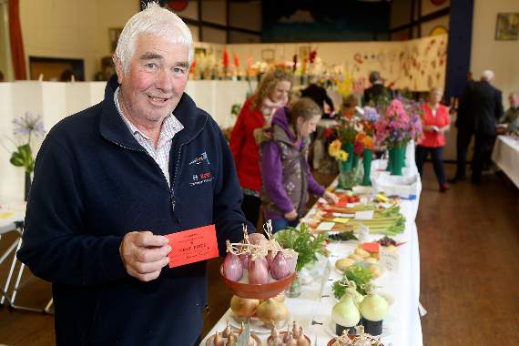 Bernard Taylor, chair of Modbury Parish Council and winner of best shallots