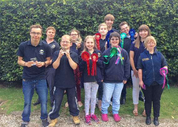 Riders from Erme Valley Riding for the Disabled with some of their winnings