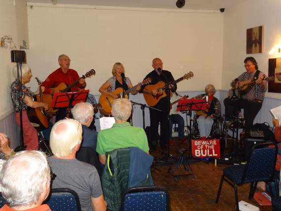 The Debman Duo, Silvington, Paul Woodcock and the Lazy Cows Ukulele Band perform at the finale of the concert