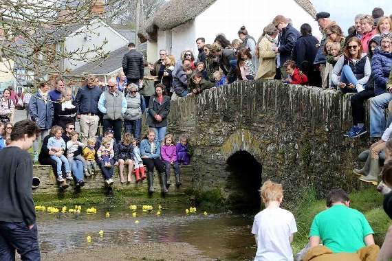 Crowds gather for the famous duck race