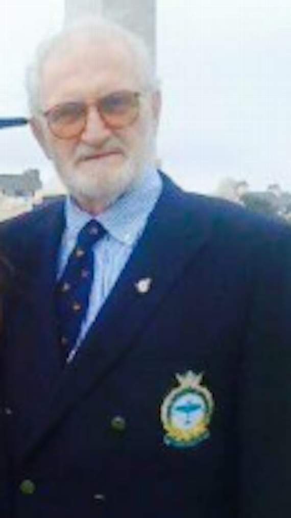 Bill Smith in his squadron jacket and tie