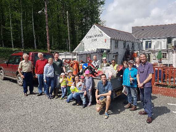 Photo: Gemma Brice. Spring cleaners with their haul of rubbish outside the Cornwood Inn.