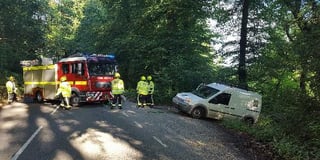 Van and driver escape unscathed after cliffhanger crash over Avon