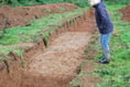 Villagers see trenches dug in historic field - but say homes planning decision jumped the gun