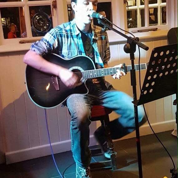 Steve’s son Aiden at an Open Mic Night