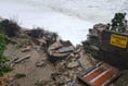 Police 'considering' evacuation of coastal villages as WW2 lookout falls into the sea