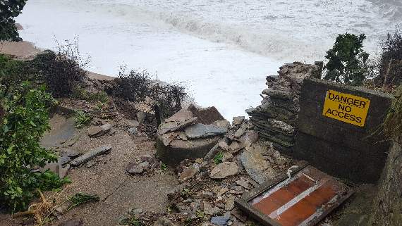 Police 'considering' evacuation of coastal villages as WW2 lookout falls into the sea
