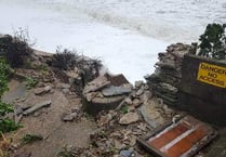 Police 'considering' evacuation of coastal villages as WW2 lookout falls into the sea