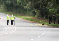 Police searching scene of suspected hit and run
